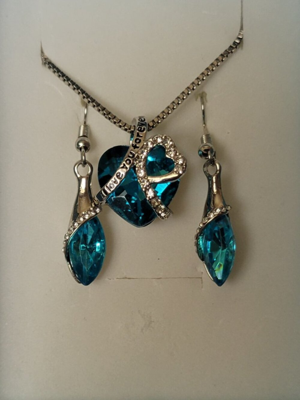 Eye catching Aquamarine Heart Necklace with Matching Earrings
